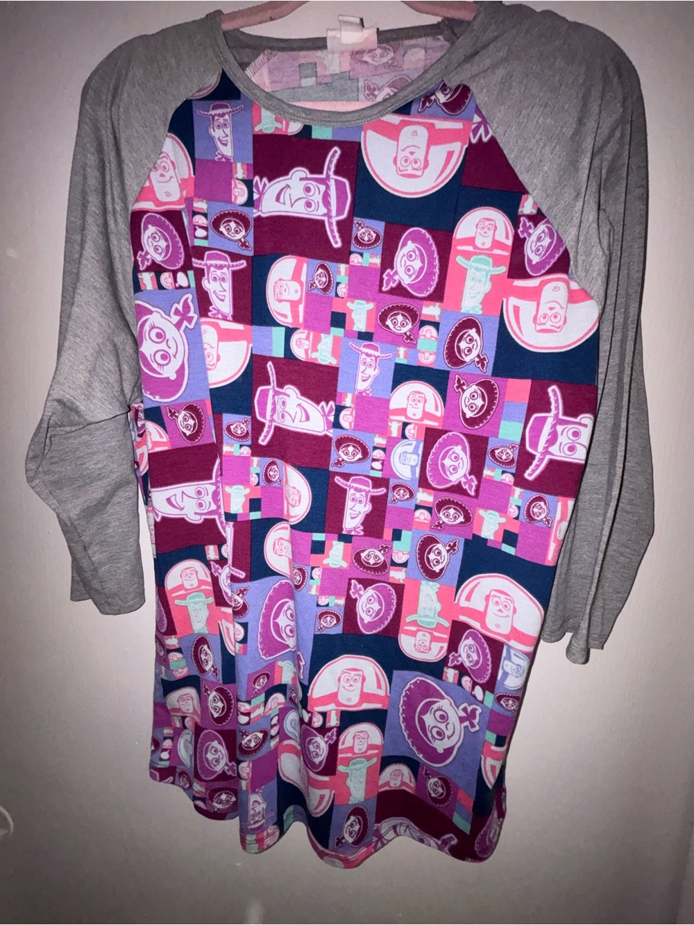 LuLaRoe women’s Purple, Pink & Gray Toy Story Block Raglan